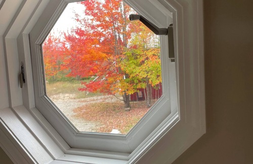 Alanson House | Spacious home, 12 miles from Nubs Nob, Harbor Springs surrounded by forest.
