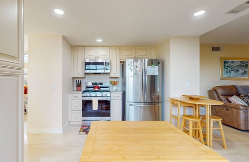 Guajome House | Spacious home in a great location with firepit, grill, games, AC, & smart TVs