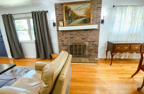 Parsons House | Spacious home in downtown Parsons! Conference room, HS internet, & private yard