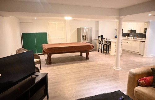 Meadowvale Village House | Spacious home in Mississauga with pool table in the basement.