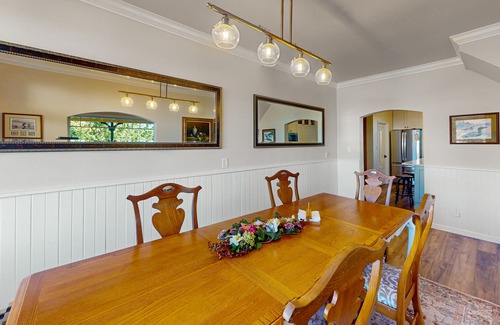 Gardiner House | Spacious home with river views, hot tub, covered porch, deck, grill, & W/D