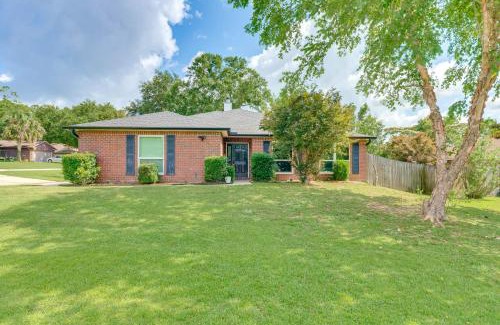 North Northwest Pensacola House | Spacious Home with Sunroom, 15 Mi to Pensacola!