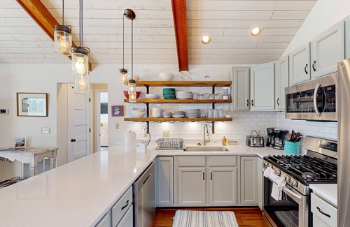 Bumpass House | Spacious house with water view, kayaks, foosball table, deck, firepit
