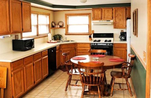 West Branch House | Spacious Lake Cabin Rental with a Private Hot Tub in Ogemaw County, Michigan