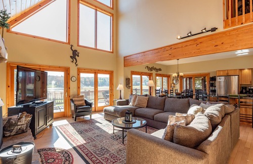 Waterfront Greens House | Spacious Lake Escape w/Hot Tub, Dock & Fireplace