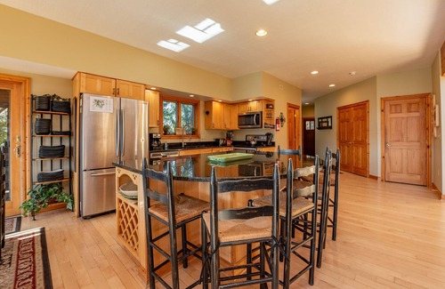 Waterfront Greens House | Spacious Lake Escape w/Hot Tub, Dock & Fireplace