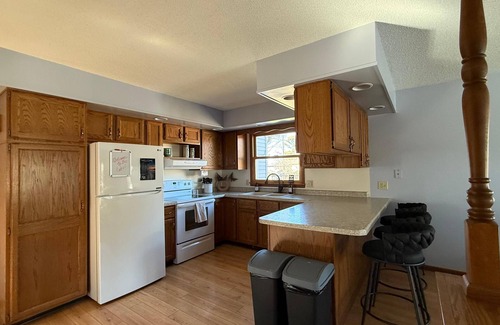 Lake Wissota House | Spacious Lakefront Home with Nostalgic Charm, Wifi, AC and a Boat Dock