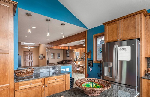 Paw Paw Lake House | Spacious lakefront home with a hot tub, private beach, washer/dryer, & AC