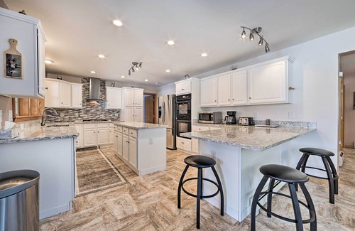 Rogers City House | Spacious Lakefront Home w/Sunroom & Bar!