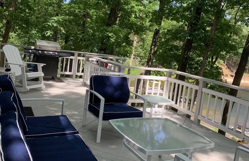 Fountain House | Spacious lakeside house on deep, all sports lake near Ludington & PM river