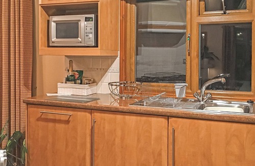 Scawton Ski Chalet | Spacious lodge with one double with en suite shower and one twin.