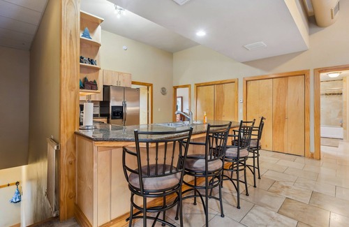 Estes Park Condo | Spacious Luxury Downtown Riverfront Loft Condo. License #6027