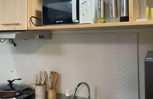 Bantud Hacienda Condo | Spacious Modern Condo with Balcony