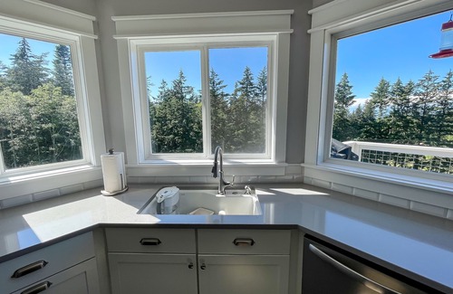 Eastsound House | Spacious & modern house with game room, outdoor firepit & peek-a-boo water views