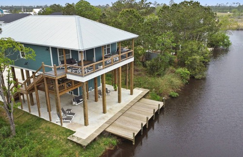 Shoreline Park House | Spacious new 4-bedroom house on a deep water canal in tranquil Bay St. Louis, MS