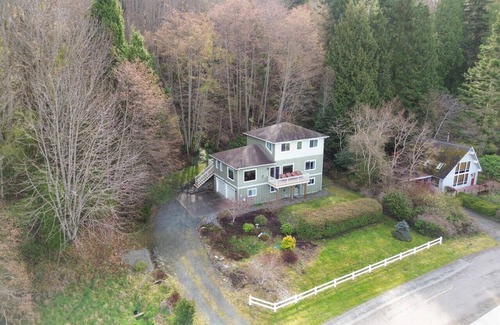 Port Angeles East House | Spacious ocean-view home with forest stream, hot tub, & private community beach!