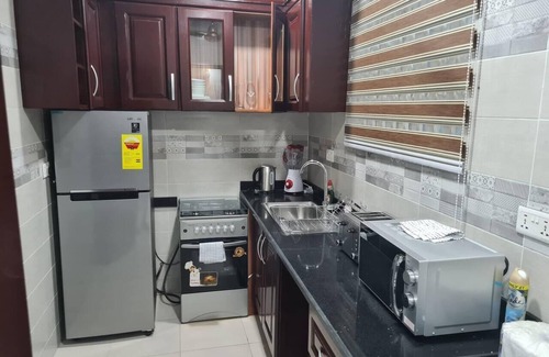 Adenta Apartment | Spacious, Quiet & Cozy- Close to Highway-Parking
