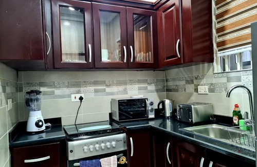 Adenta Apartment | Spacious, Quiet & Cozy- Close to Highway-Parking