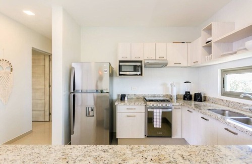 Ejidal Apartment | Spacious Retreat- Pool, Gym, 3 Balconies & Parking