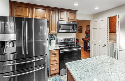 Southeast Bend House | Spacious retreat with private hot tub, dog-friendly, arcade