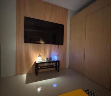 Santo Cristo Apartment | SPACIOUS RETRO UNIT at SM North Mall w Balcony and FAST WIFI