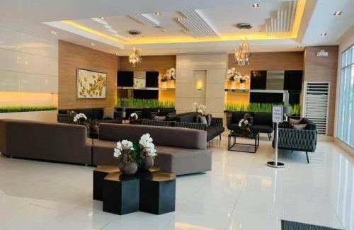 Santo Cristo Apartment | SPACIOUS RETRO UNIT at SM North Mall w Balcony and FAST WIFI