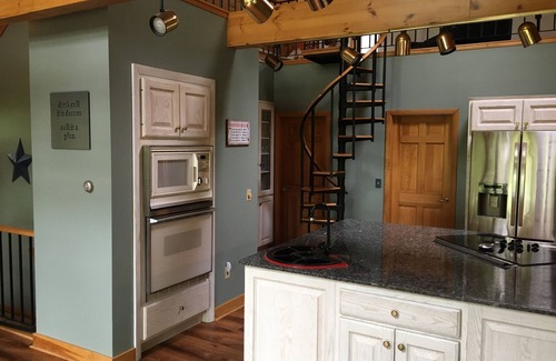 Naples House | Spacious Sebago Lake waterfront house with game room, hot tub, and covered deck.