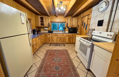 Government Camp House | Spacious Steiner Cabin on quiet street and stream.