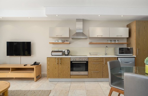 Flora Park Apartment | Spacious Studio Apartment on the Canals in CT