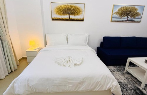 International City Apartment | Spacious Studio with balcony Trafalgar Central tower International city Dubai