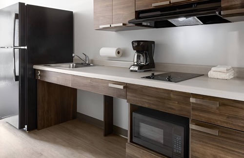 Watertown Hotel | Spacious Suite with Kitchen Perfect for Extended Stays Near Redlin Art Center