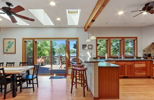Whitewater House | Spacious, Upscale Whitewater Lake Home |200+ Ft of Lake Frontage |Swim Deck |Docks |Screened Porch