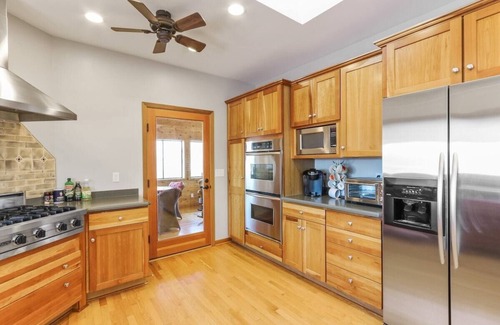 Whitewater House | Spacious, Upscale Whitewater Lake Home |200+ Ft of Lake Frontage |Swim Deck |Docks |Screened Porch