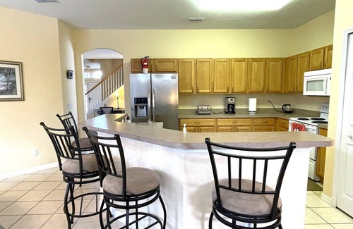 Tuscan Ridge Villa | Spacious Villa South Facing Pool 20 min to Disney