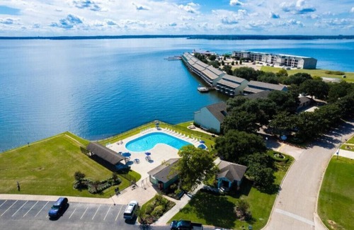 Seven Coves Condo | Spacious Waterfront Condo With Sunset Views, Pool, and Family-Friendly Amenities