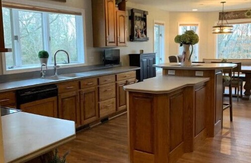 Eureka House | Spacious Waterfront Home With Riverside Bar Area - Enjoy the Fox River Lodge!