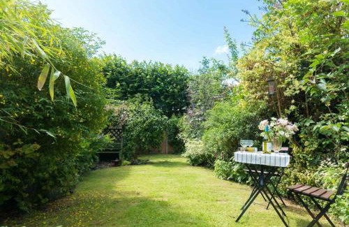 Long Melford House | Spadgers, a flax workers cottage next to fields in a Medieval Village