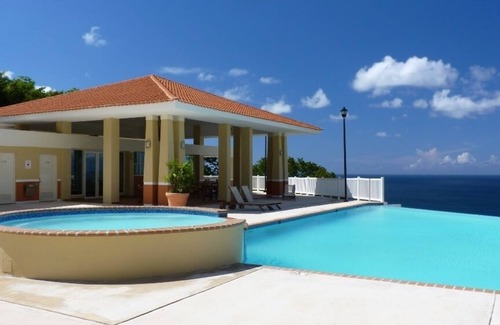 Borinquen Condo | Spain Meets the U.S. at 'Puerta Del Mar'. No Passport Required !