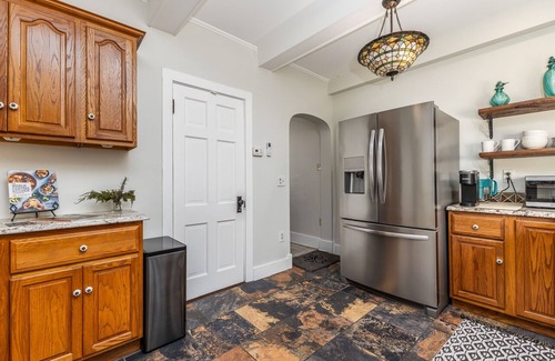 Dubuque House | Spanish Revival 1920 Home in Quiet Neighborhood