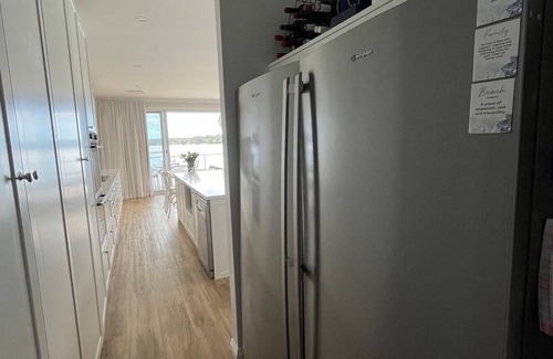 Bonnells Bay House | Sparkle by the Lake at this peaceful direct waterfront luxury homenSleeps 10