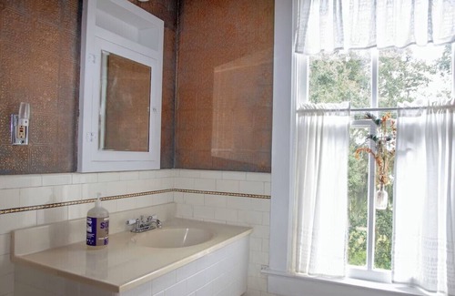 Oakland Apartment | Speakeasy Room in Central Florida's Historic Gem & wedding venue- The Oakland Manor House