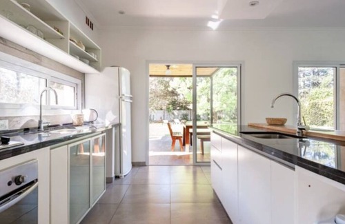 Del Viso Ski Chalet | Special home for Holidays pool and green park