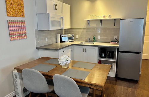 Algoma District House | Spectacular city & water view 1 bedroom apt with huge deck