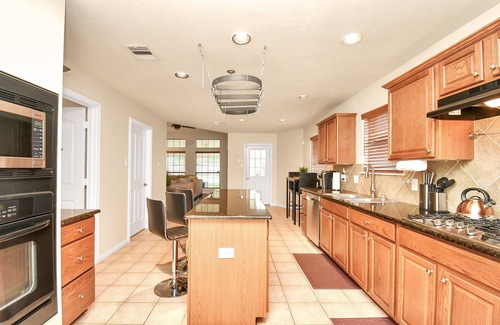 Manvel House | Spectacular Home with Private Pool, Theater&Grill!