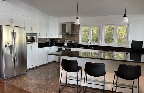Rindge House | Spectacular lake house with private dock, beach area & gorgeous views