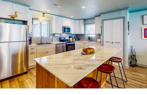 Indian Beach Condo | Spectacular partial ocean view 2BR 2BA large top floor condo-beachfront complex!