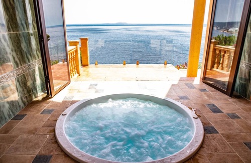 Badia de Palma Villa | Spectacular Sea Front, Beach 5 mins walk, Large Heated Jacuzzi