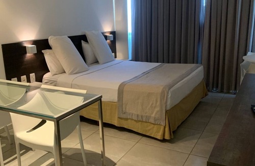 Cruz das Almas Hotel | Spectacular seafront apartment in the ritz suites hotel