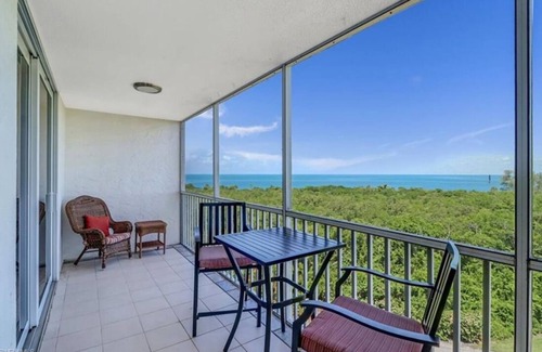 Vanderbilt Beach Condo | Spectacular unobstructed GULF, BAY and SUNSET view, 5 minutes walk to the beach.