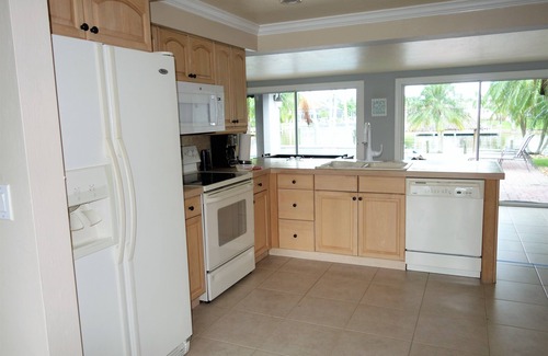 Yacht Club House | Spectacular Wide Intersecting Canals, River Views-Awesome Tiki huts